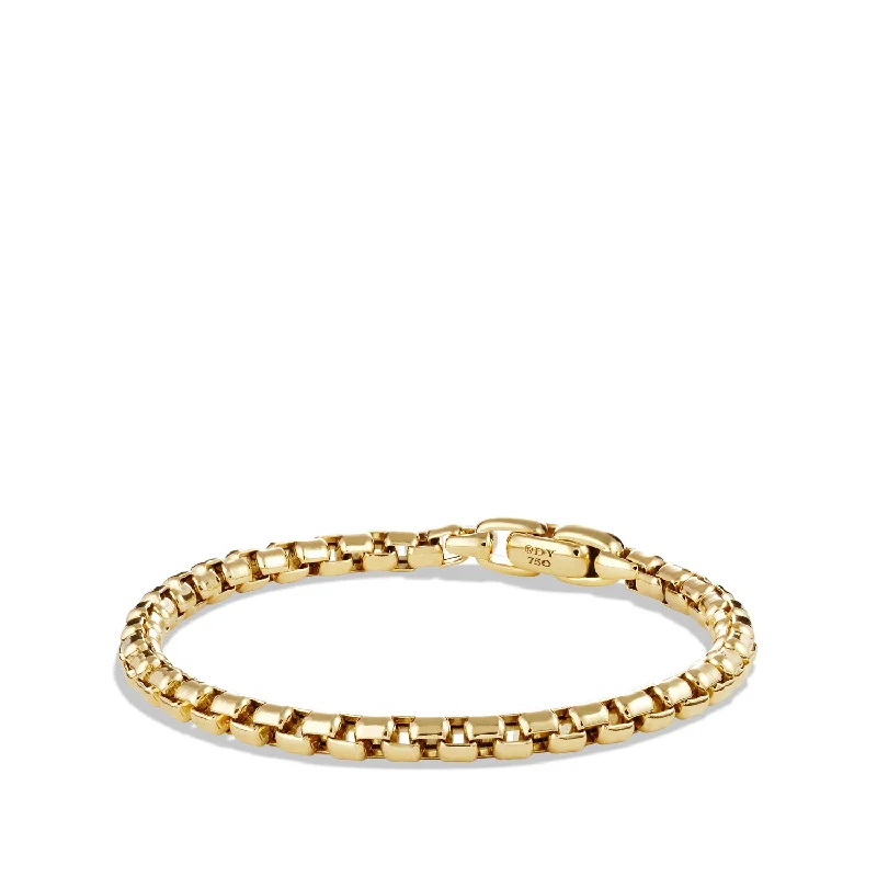 Bangles with bold hematite for metallic shine -David Yurman   Bracelet in 18-Karat Yellow Gold