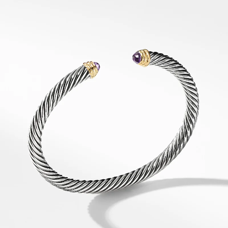 Bangles with twisted metal bands for flair -David Yurman  Bracelet in Silver and 14-Karat Yellow Gold