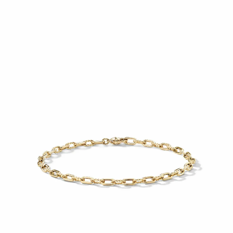 Rose gold bangles with geometric cutout designs -David Yurman The Madison® Collection Bracelet in 18-Karat Yellow Gold