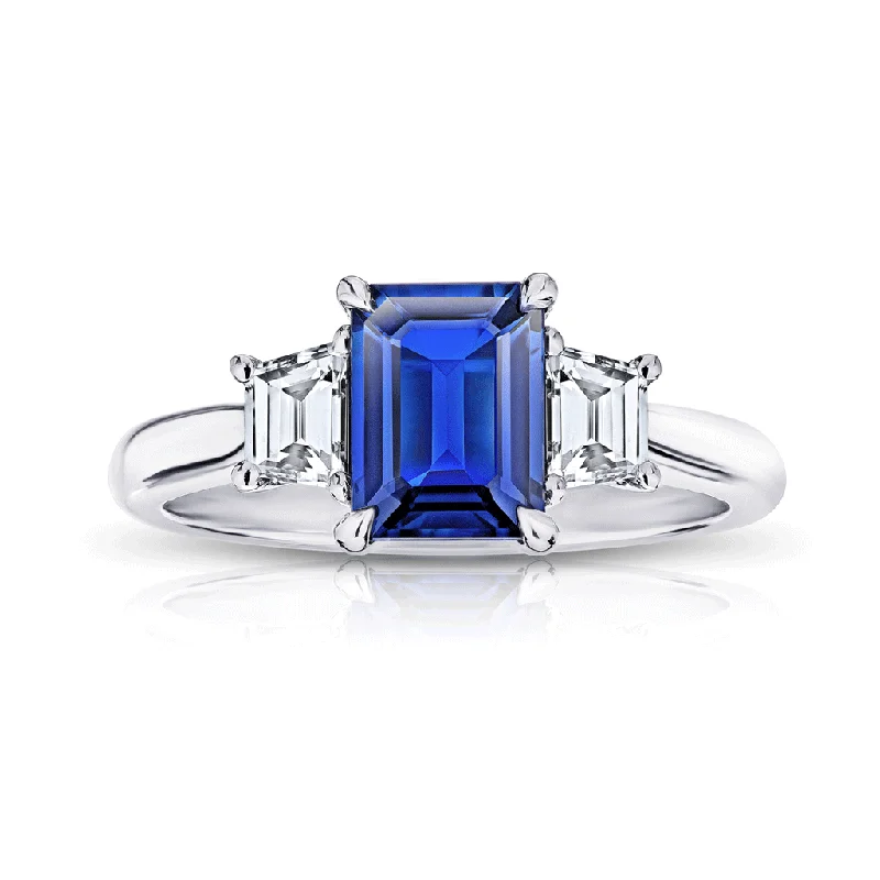 Rings with gothic-inspired skull motif details -Classic Emerald Cut Blue Sapphire Three Stone Engagement Ring