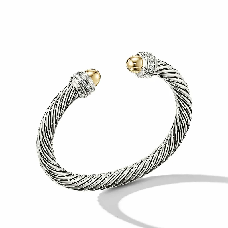 Bangles with chunky designs for statement wear -David Yurman  Bracelet in Silver and 14-Karat Yellow Gold