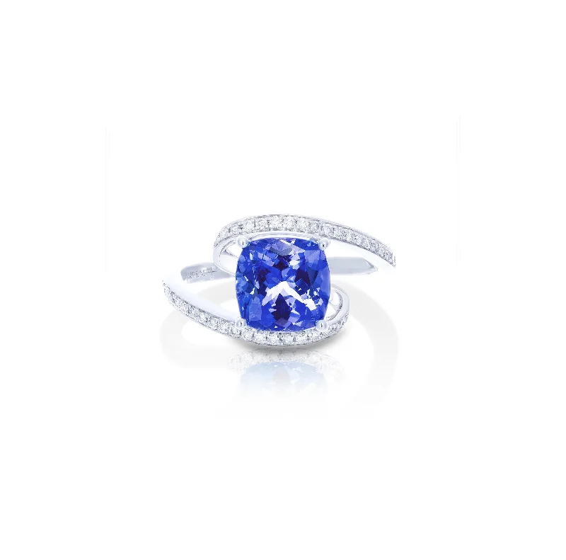 Rings with carved onyx for bold sleekness -Sabel Collection White Gold Tanzanite and Diamond Swirl Ring