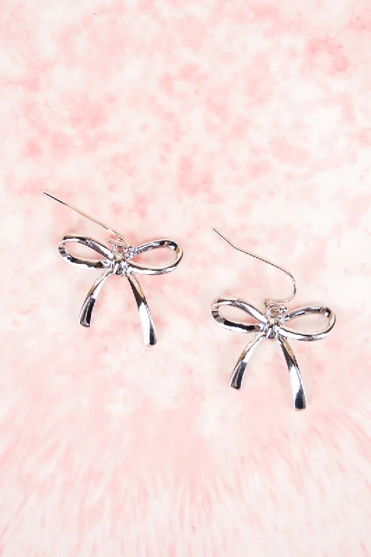 Drop Earrings for Everyday Glamour -Crystal Avenue Silvertone Bow Earrings