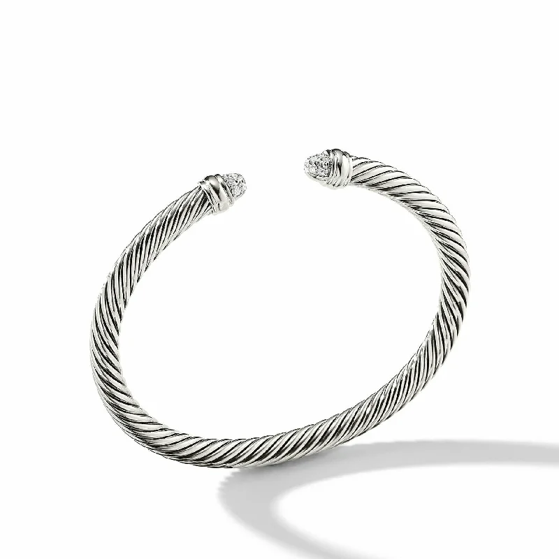 Bangles with tiger eye bands for warmth -David Yurman  Bracelet in Sterling Silver