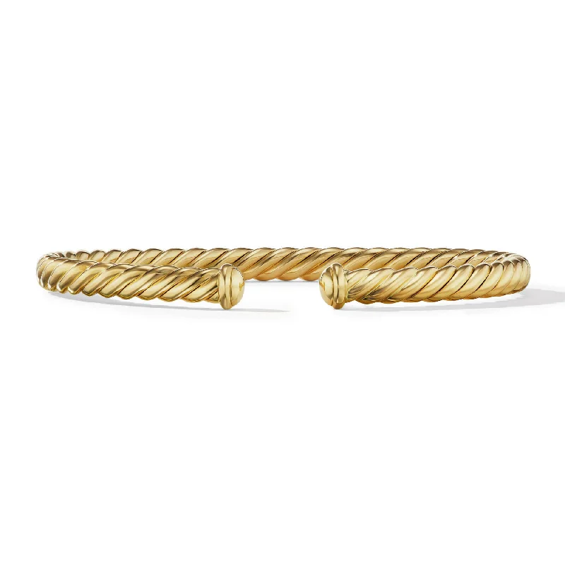 Bangles with polished onyx for bold sleekness -David Yurman  Bracelet in 18-Karat Yellow Gold