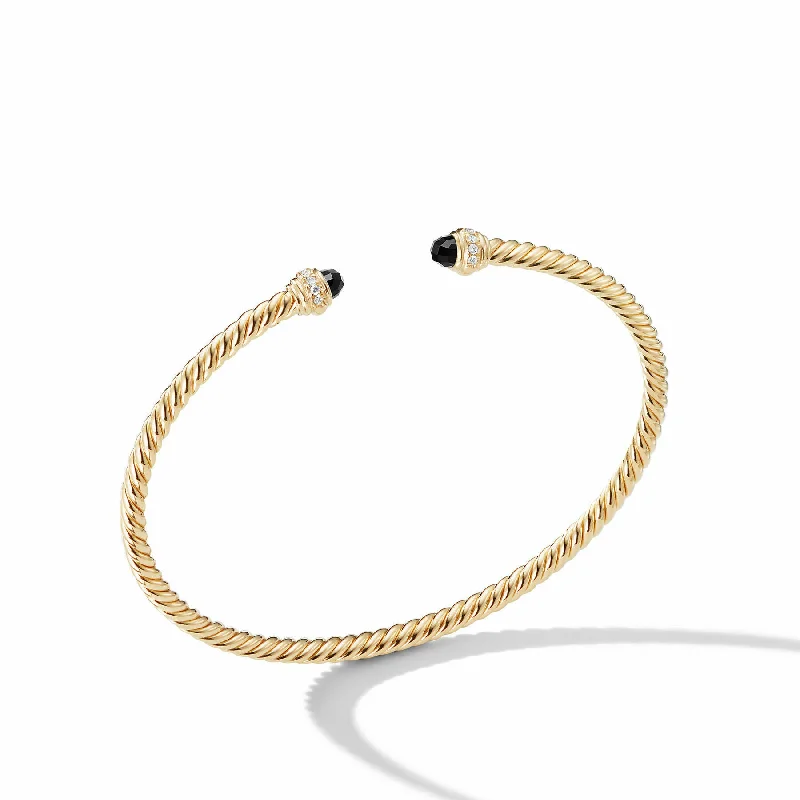 Bracelets with moonstone gems for mystic appeal -David Yurman  Bracelet in 18-Karat Yellow Gold