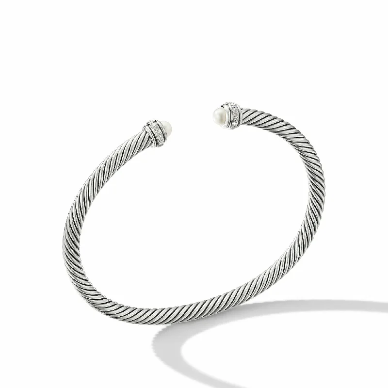 Bracelets with wave engravings for ocean vibes -David Yurman  Bracelet in Sterling Silver