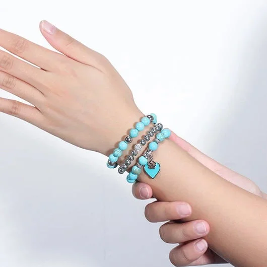 Bangles with tiger eye bands for warmth -Wholesale Turquoise Heart Pendant Alloy Bracelet