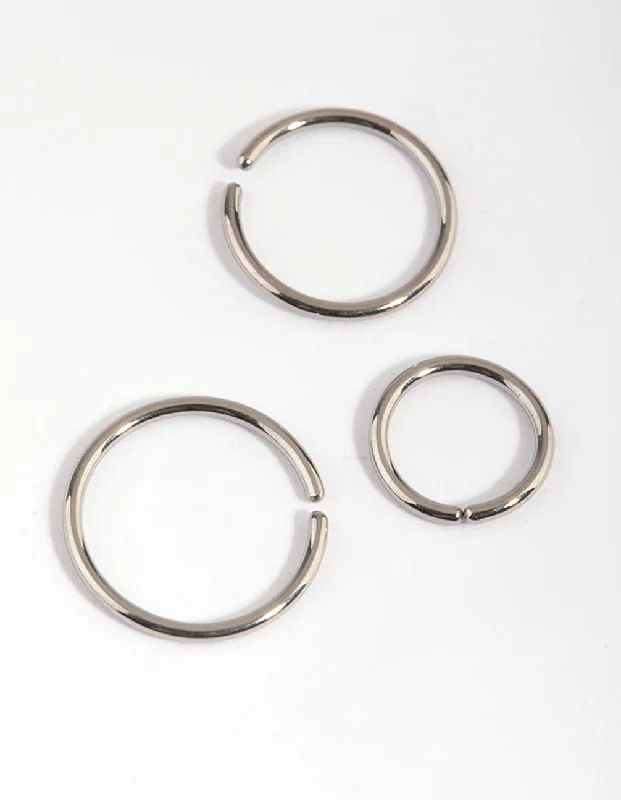 Platinum rings with sparkling sapphire center stones -Titanium Nose Ring Pack