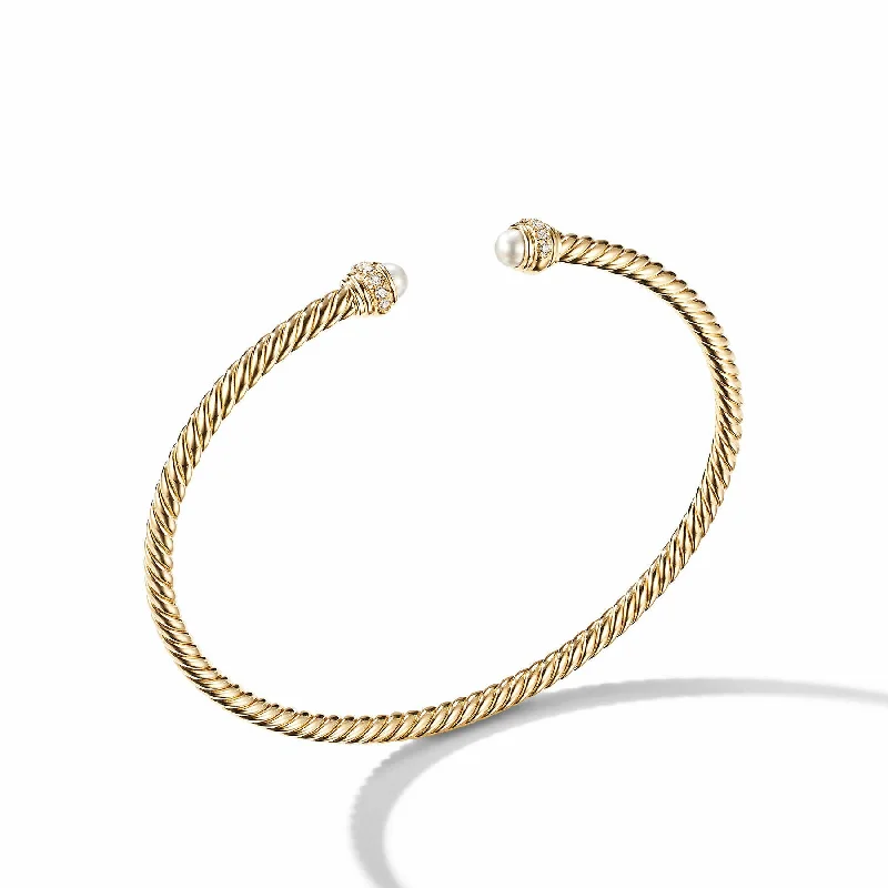 Silver bangles featuring vibrant turquoise stone inlays -David Yurman  Bracelet in 18-Karat Yellow Gold