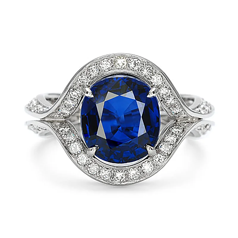 Gold rings with intricate celtic knot patterns -Duet Oval Blue Sapphire & Diamond Ring